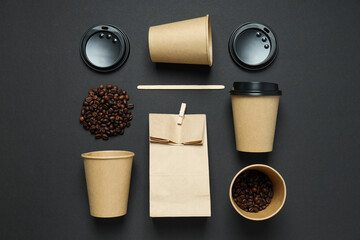 Craft cups for coffee with coffee beans on a black background