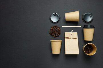 Craft cups for coffee with coffee beans on a black background
