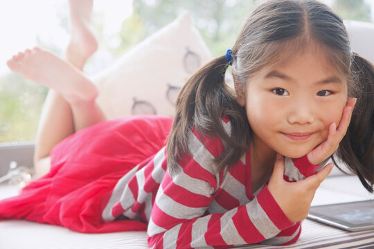 Portrait of Young Girl Wearing Stripy T-shirt
