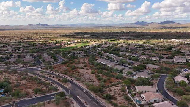 Aerial hyperlapse of North Scottsdale Neighborhood overlooking Carefree Highway in Arizona