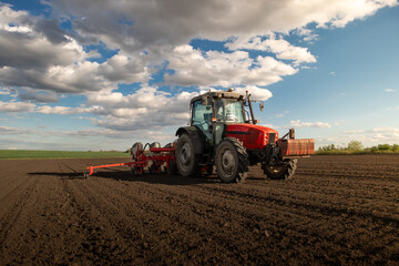 Tractor and seeder for sowing corn