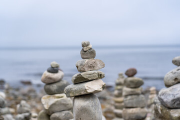 Beach covered in a pile of stacked stones