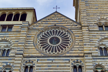 Details at facade of Genoa Cathedral or Metropolitan Cathedral of Saint Lawrence in Genoa, Italy.