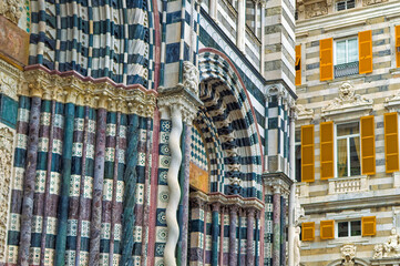 Details at facade of Genoa Cathedral or Metropolitan Cathedral of Saint Lawrence in Genoa, Italy.