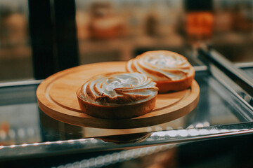 Delicious pastries in glass display case