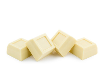 White chocolate blocks on white background.