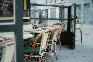 a table with chairs set up at a patio for dining