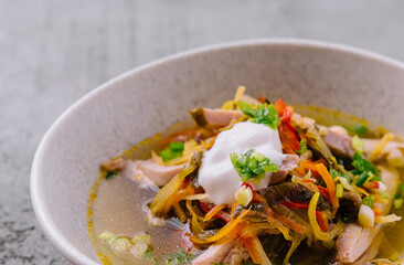 Traditional mexican sopa azteca in a white bowl