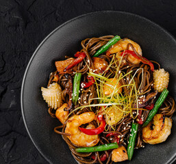 Asian stir-fried noodles with shrimp and vegetables