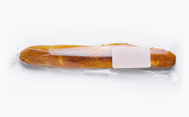 Fresh baguette in transparent packaging