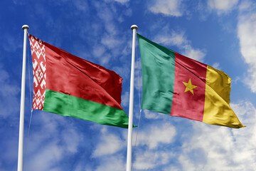 3d illustration. Belarus and Cameroon Flag waving in sky. High detailed waving flag. 3D render. Waving in sky. Flags fluttered in the cloudy sky.