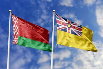 3d illustration. Belarus and Niue Flag waving in sky. High detailed waving flag. 3D render. Waving in sky. Flags fluttered in the cloudy sky.