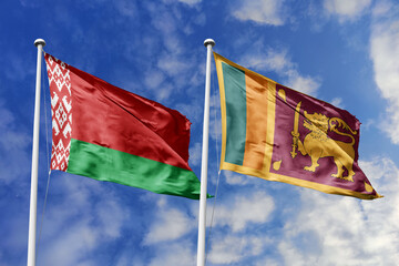 3d illustration. Belarus and Sri Lanka Flag waving in sky. High detailed waving flag. 3D render. Waving in sky. Flags fluttered in the cloudy sky.