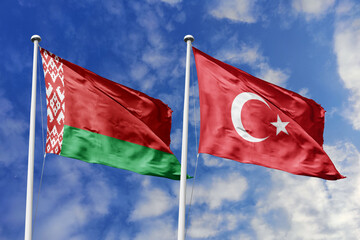 3d illustration. Belarus and Turkey Flag waving in sky. High detailed waving flag. 3D render. Waving in sky. Flags fluttered in the cloudy sky.