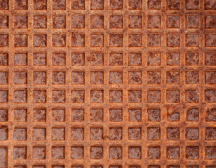 Naklejka premium old rusty metal surface with square pattern, grunge abstract background