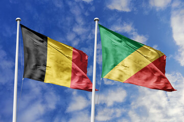 3d illustration. Belgium and Republic of the Congo Flag waving in sky. High detailed waving flag. 3D render. Waving in sky. Flags fluttered in the cloudy sky.