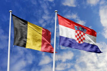 3d illustration. Belgium and Croatia Flag waving in sky. High detailed waving flag. 3D render. Waving in sky. Flags fluttered in the cloudy sky.