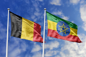 3d illustration. Belgium and EthiopiaFlag waving in sky. High detailed waving flag. 3D render. Waving in sky. Flags fluttered in the cloudy sky.