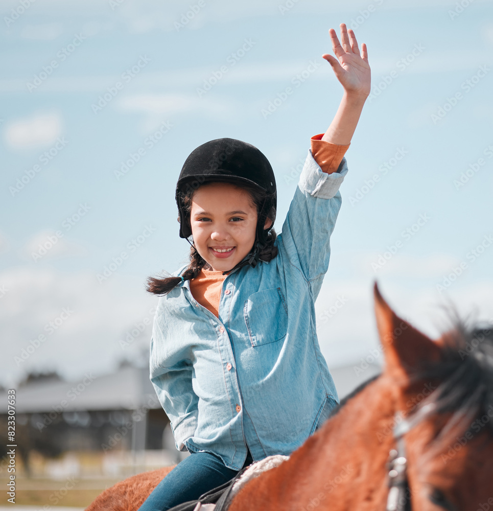 Wall mural Child, portrait and riding horse in countryside on farm ranch for horseback learning, activity and helmet for safety in summer. Smile, girl and animal on field for lessons as childhood sport for race