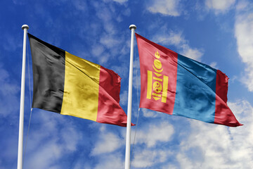 3d illustration. Belgium and Mongolia Flag waving in sky. High detailed waving flag. 3D render....