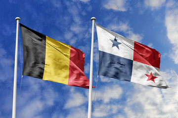 3d illustration. Belgium and Panama Flag waving in sky. High detailed waving flag. 3D render. Waving in sky. Flags fluttered in the cloudy sky.