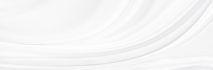 White gray satin texture that is white silver fabric silk panorama background with beautiful soft blur pattern natural.