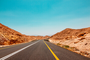 Desert road among the mountains, view of the mountain landscape in the Judean Desert in southern Israel. High quality photo