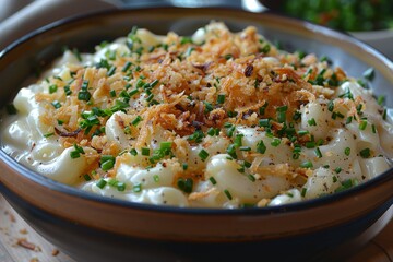 Spätzle - Soft egg noodles topped with cheese and crispy onions. 