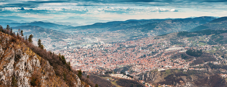 A captivating aerial view of Sarajevo's cityscape nestled amidst the scenic hills of Bosnia and Herzegovina.