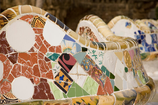 Vibrant tiles adorned with intricate patterns in Park Guell in Barcelona