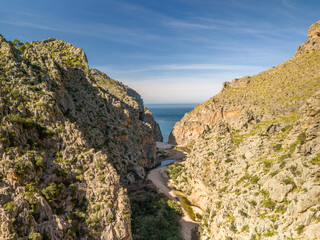 Majestic mountains with the blue sky in the background. Sa Calobra beach, Mallorca