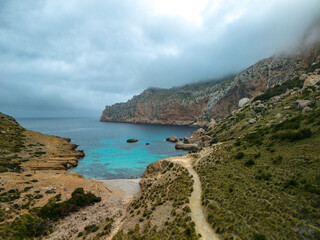 Aerial view of the majestic mountains and turquoise waters. Cala Boquer beach, Mallorca