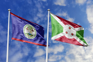 3d illustration. Belize and Burundi Flag waving in sky. High detailed waving flag. 3D render....