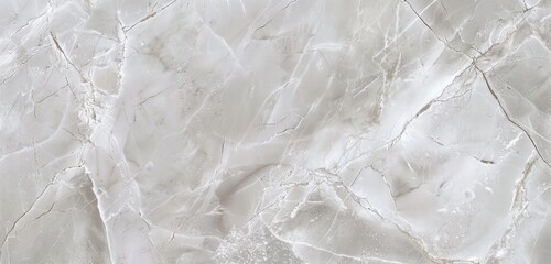 Obraz premium A light grey marble texture with subtle veining, perfect for creating an elegant and sophisticated background for interior design projects