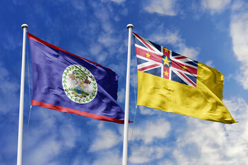 3d illustration. Belize and Niue Flag waving in sky. High detailed waving flag. 3D render. Waving...