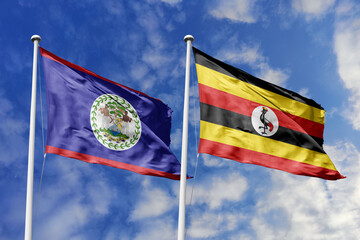 3d illustration. Belize and Uganda Flag waving in sky. High detailed waving flag. 3D render. Waving...