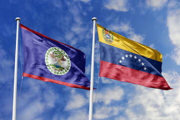3d illustration. Belize and Venezuela Flag waving in sky. High detailed waving flag. 3D render....