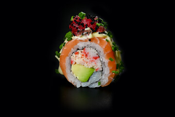 Sushi on black background in restaurant setting, ideal for food photography
