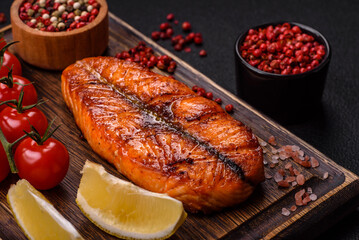 Fresh cooked delicious salmon steak with spices and herbs