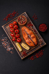 Fresh cooked delicious salmon steak with spices and herbs