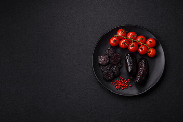Delicious black blood sausage or black pudding with spices