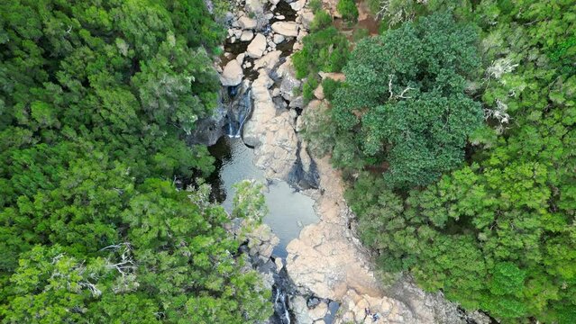 Ascending drone footage of Risco Waterfall in Rabacal, Paul da Serra, Madeira Island, Portugal