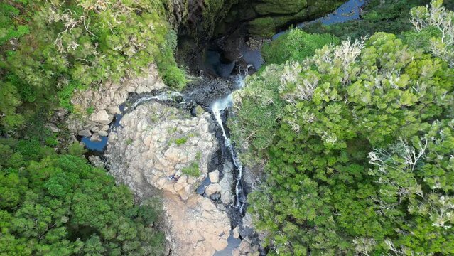 Top down drone shot of Risco Waterfall located in Rabacal, Paul da Serra, Madeira Island, Portugal