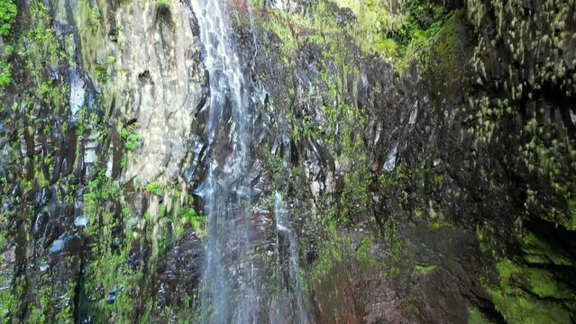 Scenic view of Risco Waterfall on a sunny day in Rabacal, Paul da Serra, Madeira Island, Portugal