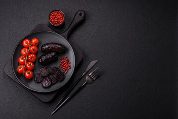Delicious black blood sausage or black pudding with spices