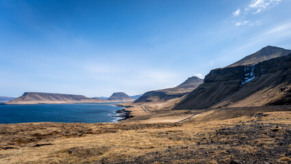 Scenic view of Icelandic mountains and blue sea