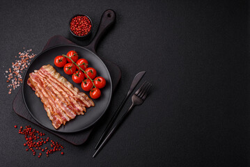 Delicious bacon in the form of slices with salt, spices and herbs