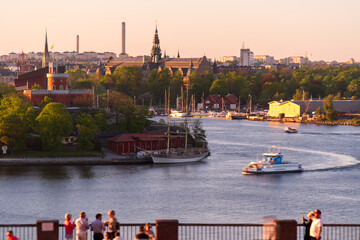 Stockholm, Sweden. Tourists and locals at the Fjällgatan street viewpoint, overlooking the...