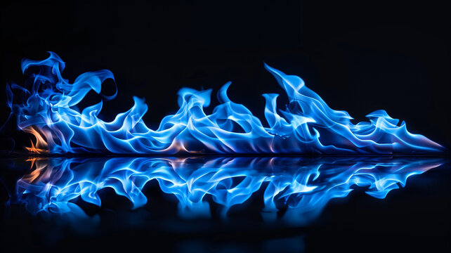Flame of blue fire burning on black background with reflection