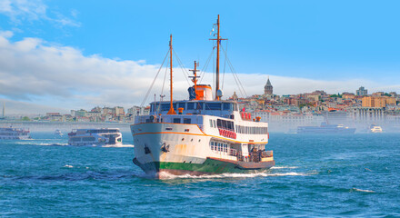 Sea voyage with old ferry (steamboat) on the Bosporus - Coastal cityscape with modern buildings and...